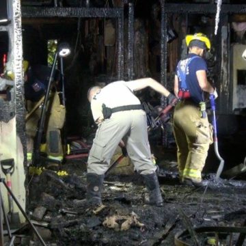 FIREFIGHTERS RESCUE TEEN FROM BURNING HOUSE