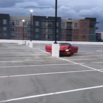 IDIOT DOING DOUGHNUTS ON WOODLANDS PARKING GARAGE CRASHES INTO POLE