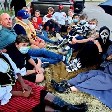 Woodlands Scout troop gives back with reverse trick-or-treat project