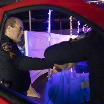 MCSO’s blue elves gift Christmas toys to hundreds of children in need
