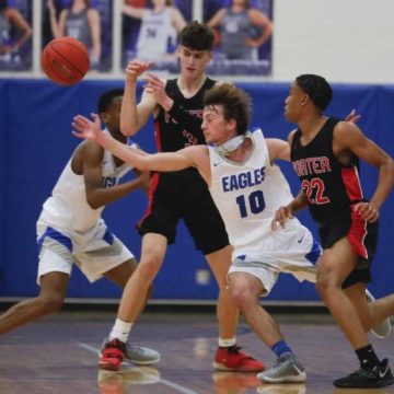 BOYS HOOPS: New Caney wins delayed home opener over rival Porter