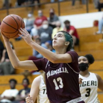 HOOPS ROUNDUP: Magnolia’s Huetter reaches milestone; New Caney girls win big