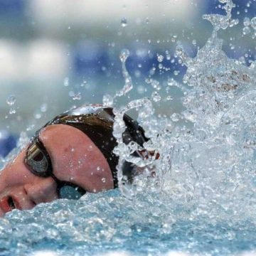 SWIMMING AND DIVING: Magnolia girls claim District 21-5A title