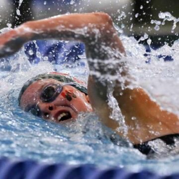 SWIMMING AND DIVING: The Woodlands girls dominate regional meet