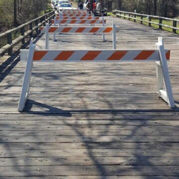 CUT AND SHOOT BRIDGE PARTIALLY CLOSED