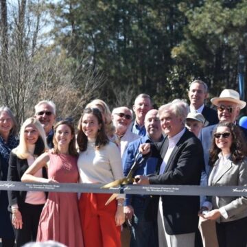 Pedestrian bridge on The Woodlands Waterway named for Robert Heineman, retiring after 48-year planning career