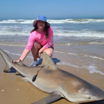 Conroe girl reels in first bull shark while fishing with dad
