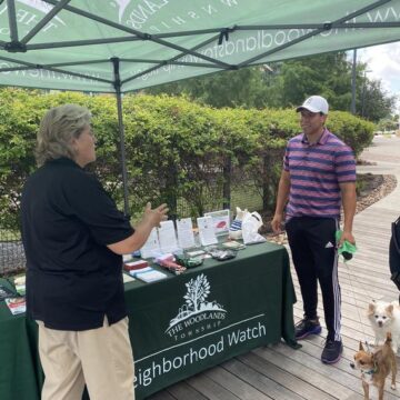 Residents learn about crime awareness program, Dog Watcher Walk, and water safety at ‘Paddle with Your Pup’ in The Woodlands