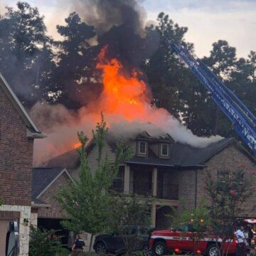 FIREFIGHTERS CONTINUE FIGHTING CONROE BLAZE