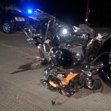 IMPAIRED DRIVER REAR-ENDS MOTORCYCLE STOPPED FOR RED LIGHT-DRIVER CRITICAL
