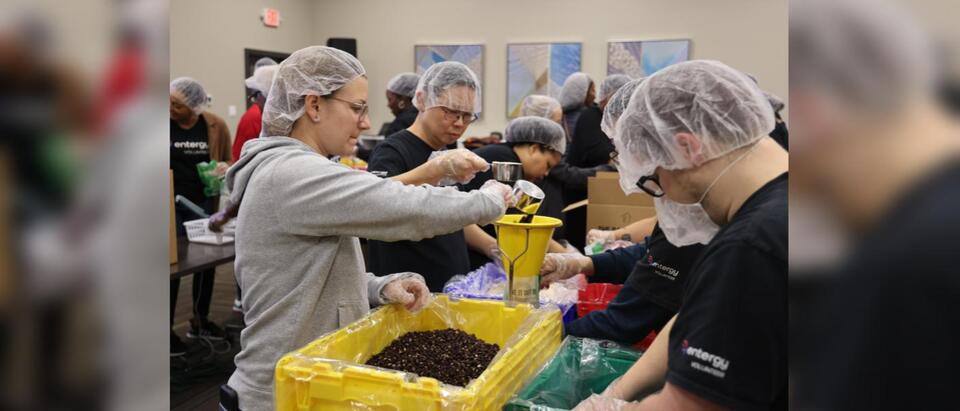 135dmY_18BLjpIb00.jpg Entergy volunteers pack more than 20,000 meals to combat hunger in Southeast Texas