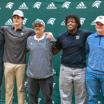 Four Woodlands Christian Academy Football Athletes celebrate Signing Day